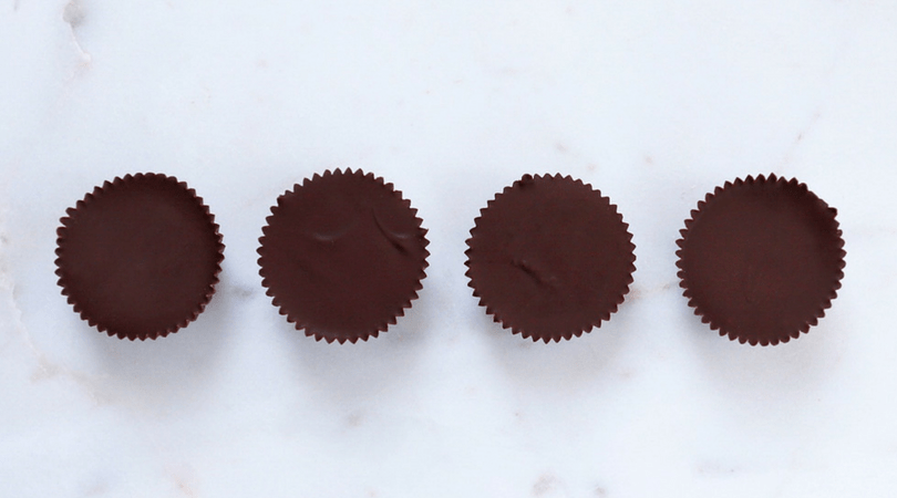 Low FODMAP Chocolate Peanut Butter Cups on Countertop