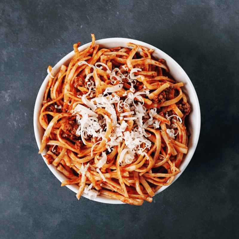 Low FODMAP Spicy Pasta Sauce with spaghetti in bowl