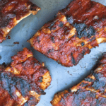 Low FODMAP BBQ ribs on baking sheet