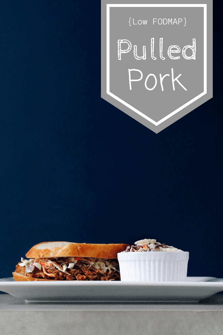 Low FODMAP Pulled Pork sandwich on plate with text overlay: Low FODMAP Pulled Pork