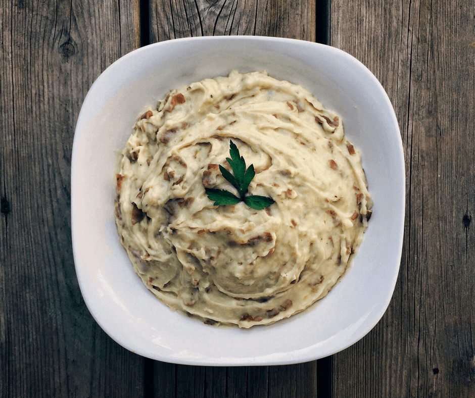 Low FODMAP Roasted Garlic Mashed Potatoes in serving dish