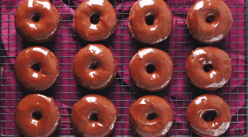 Low FODMAP Chocolate Doughnuts on wire rack