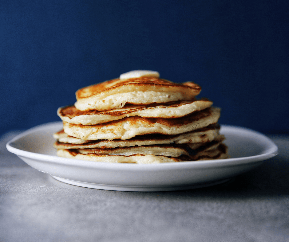 Low FODMAP pancakes stacked on a plate.