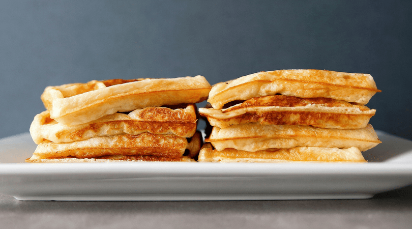 Low FODMAP sourdough waffles stacked on plate