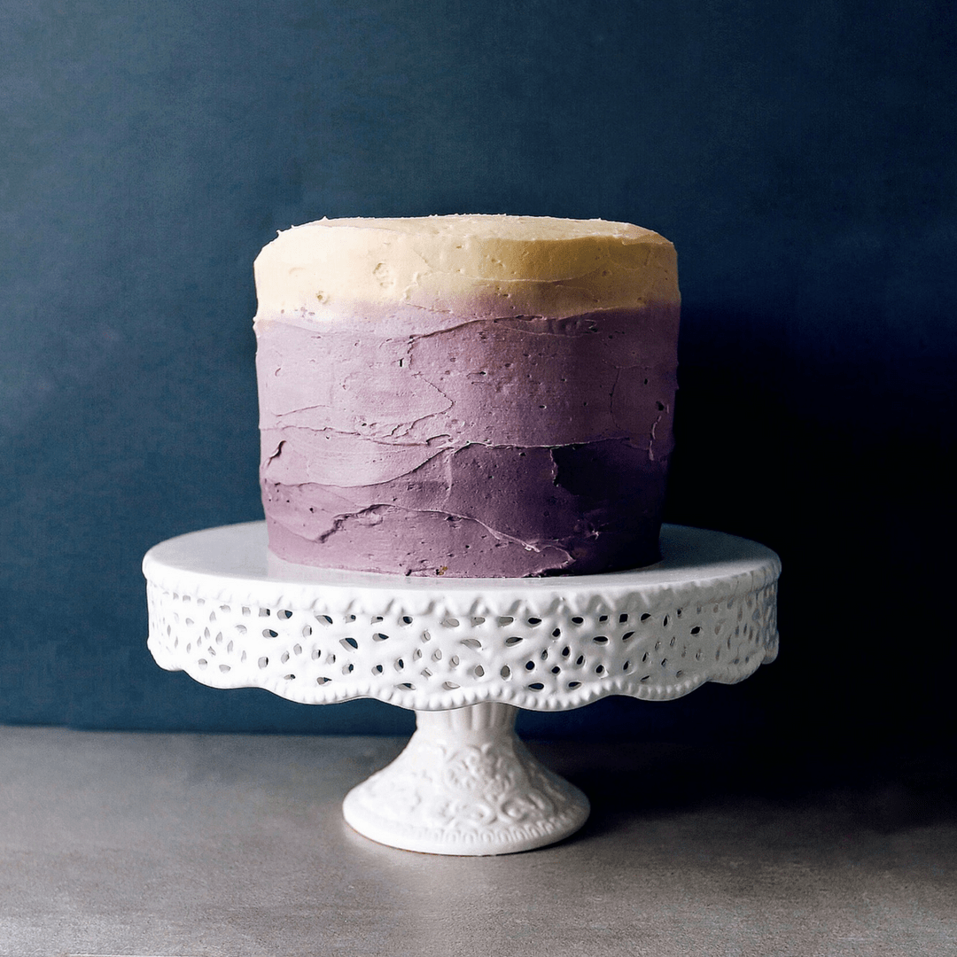 Low FODMAP Lemon Cake on cake stand