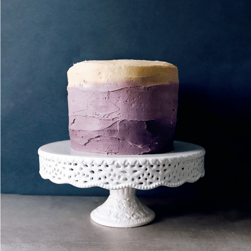 Low FODMAP Lemon Cake on cake stand