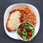Low FODMAP Chicken Parmesan with side salad