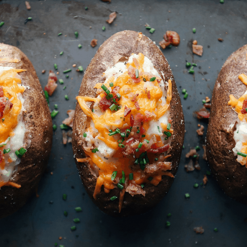 three low FODMAP twice baked potatoes on baking sheet