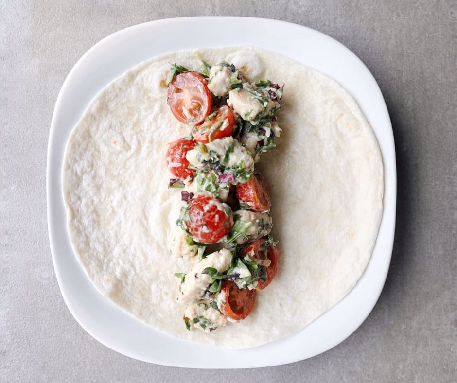 Low FODMAP Chicken Caesar Wrap on plate - 940 x 788