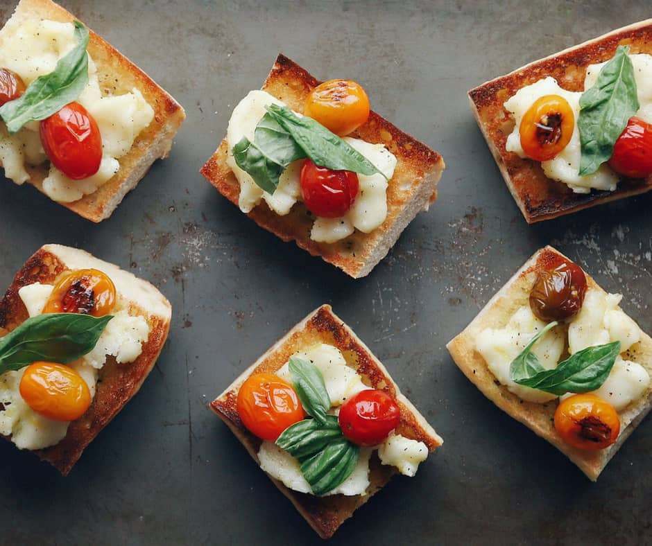 Low FODMAP Blistered Caprese Bites on Tray