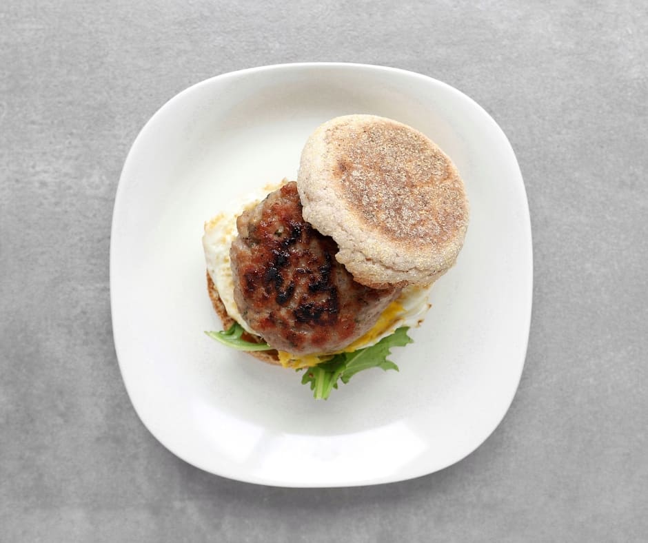 Low FODMAP Breakfast Sausage Sandwich on Plate - Facebook Post