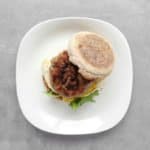 Low FODMAP Breakfast Sausage Sandwich on Plate - Feature Image