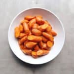 Low FODMAP brown butter carrots piled in bowl - 800 x 800