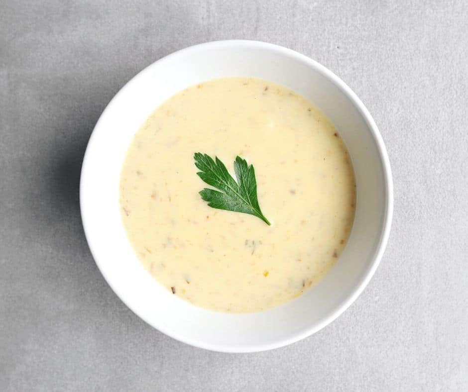 Low FODMAP Cream of Mushroom Soup in white bowl