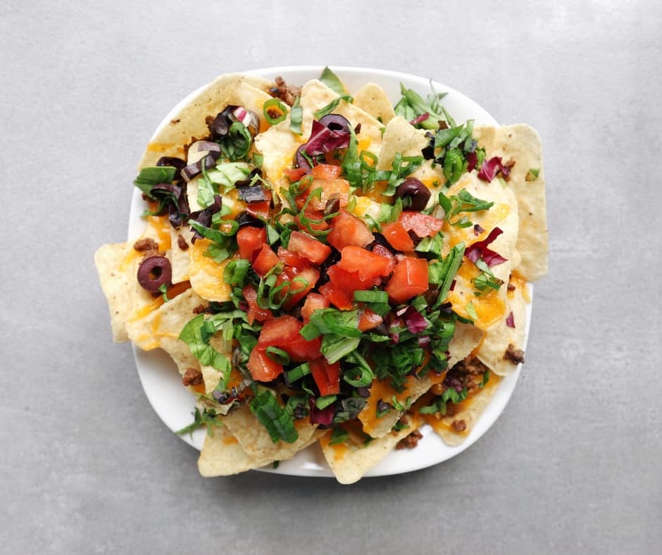 Low FODMAP Fully Loaded Nachos on Plate - 940 x 788