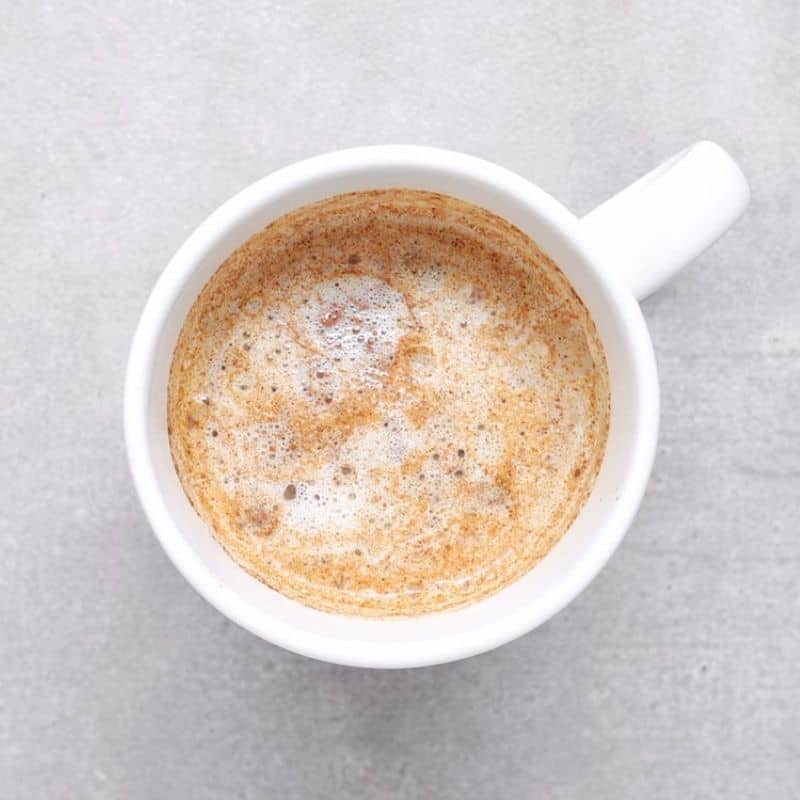 Low FODMAP gingerbread latte in white mug