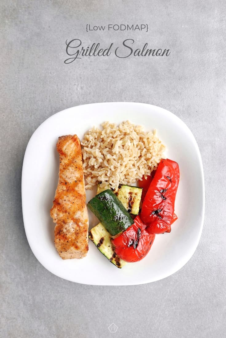 Low FODMAP grilled salmon with vegetables and rice on plate