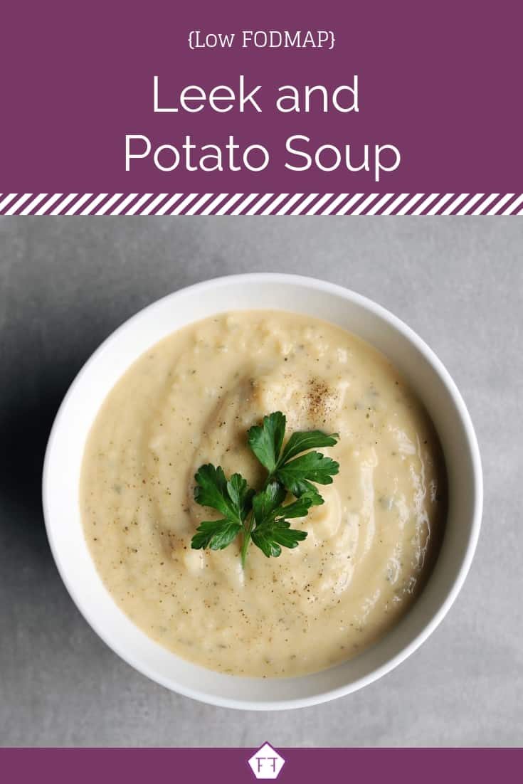 Low FODMAP leek and potato soup in white bowl with parsley garnish - Pinterest 2