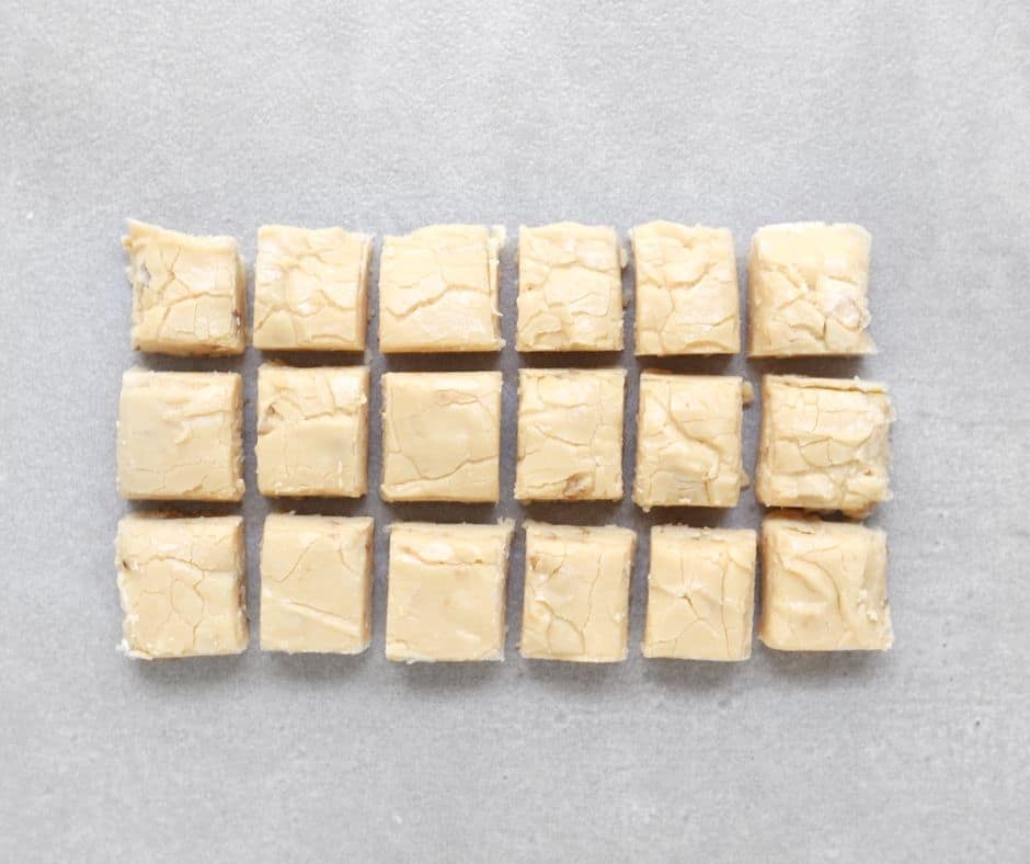 Low FODMAP maple whisky fudge squares on grey background