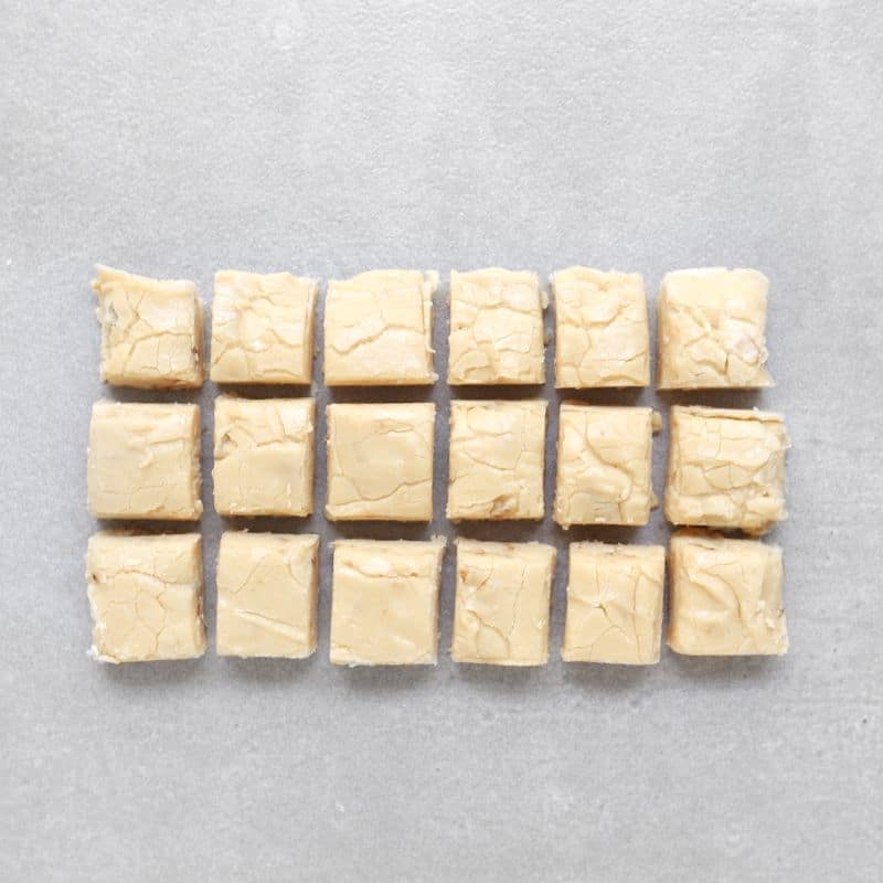 Low FODMAP maple whisky fudge squares on grey tile