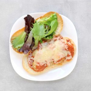 Low fodmap meatball sub on white plate