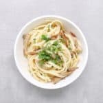 Low FODMAP mushroom linguini with fresh parsley - Feature Image