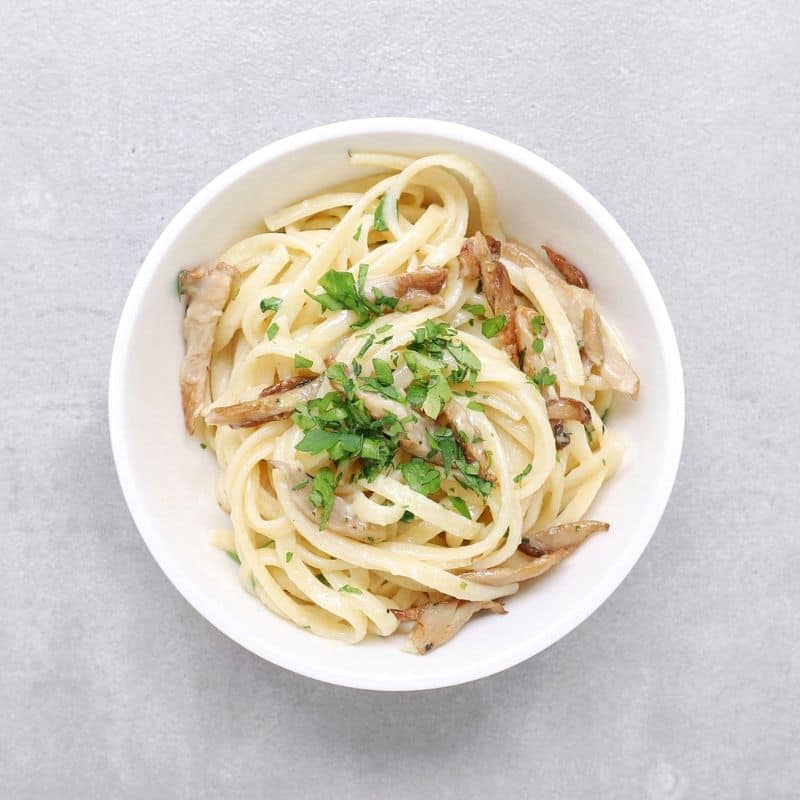 Low FODMAP mushroom linguini with fresh parsley - Feature Image