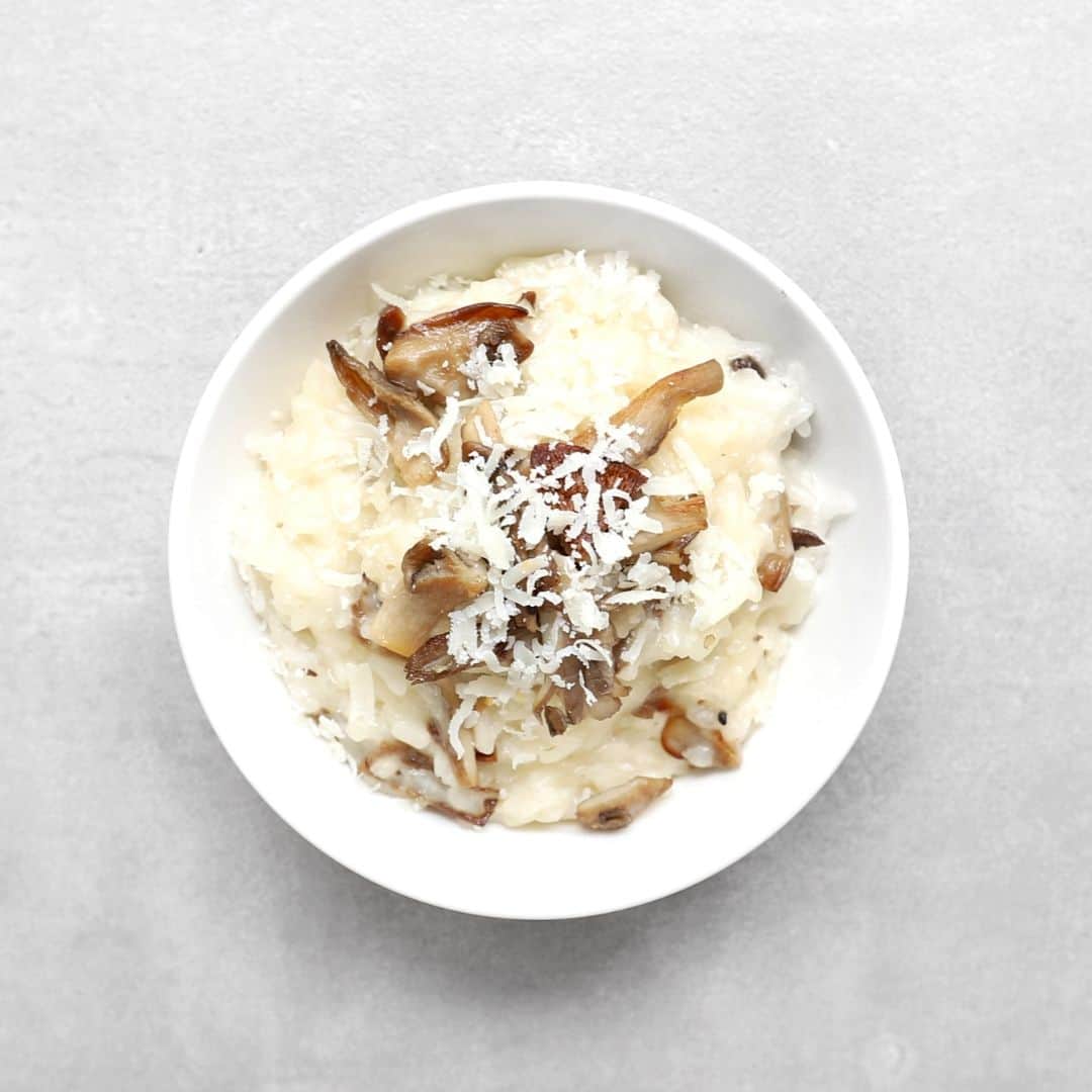 Low FODMAP mushroom risotto in white bowl