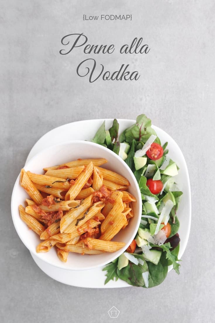 Low FODMAP penne alla vodka on plate with side salad - Pinterest 5