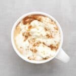 Low FODMAP pumpkin latte in white mug