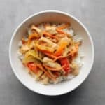Low FODMAP Red Curry in white bowl on grey surface - 800 x 800