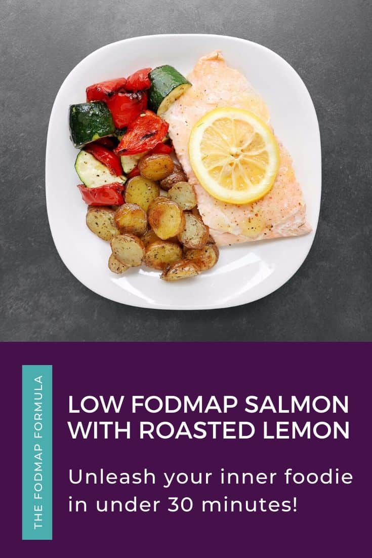 Low FODMAP salmon with roasted lemon, roasted vegetables, and potatoes on plate