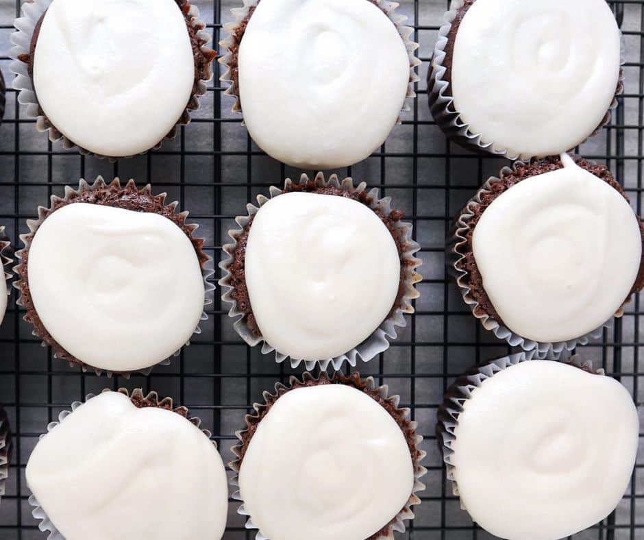 Salted caramel cupcakes on wire rack