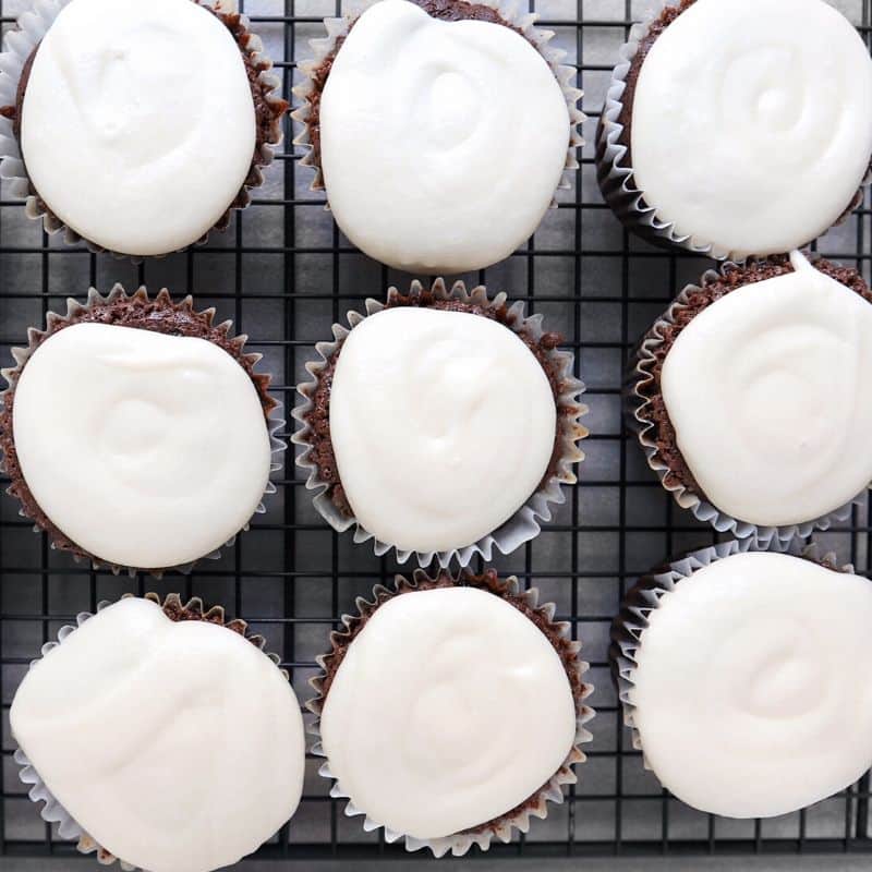 Salted caramel cupcakes on wire rack