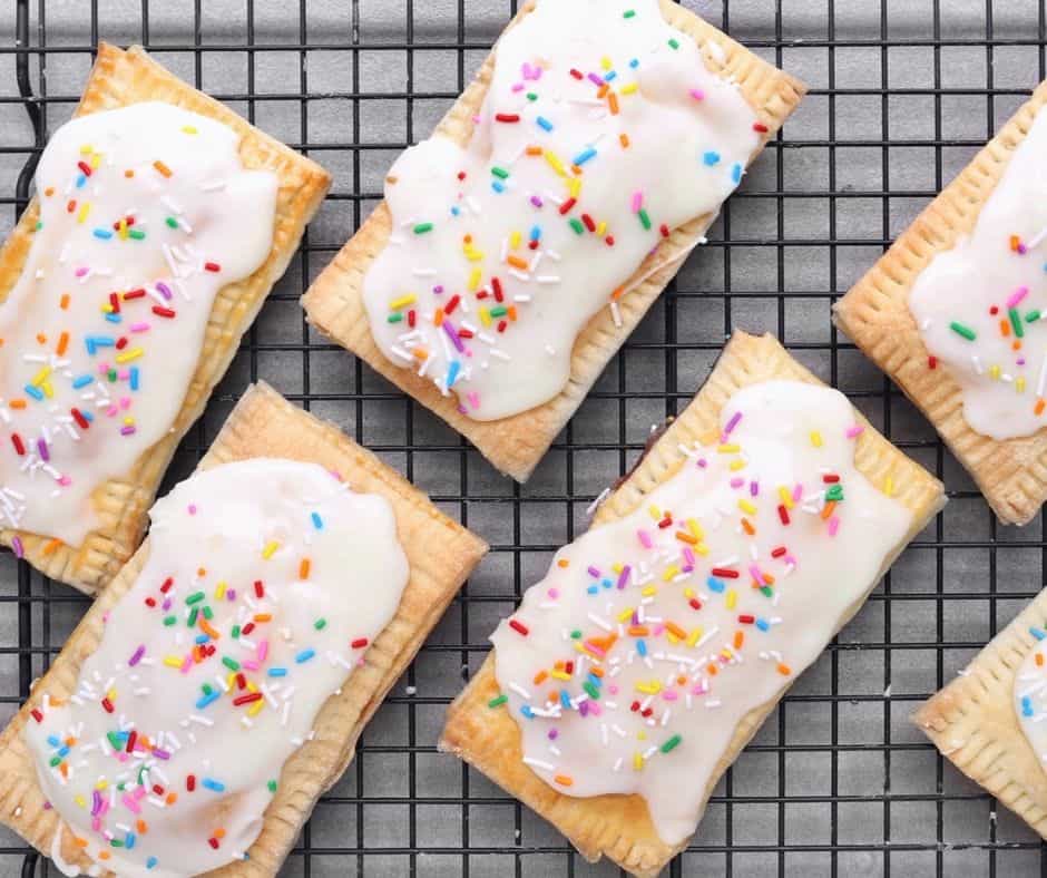 Low FODMAP strawberry hand pies on wire rack