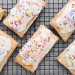 Low FODMAP strawberry hand pies on wire rack