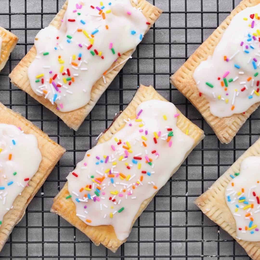 Low FODMAP strawberry hand pies on wire rack