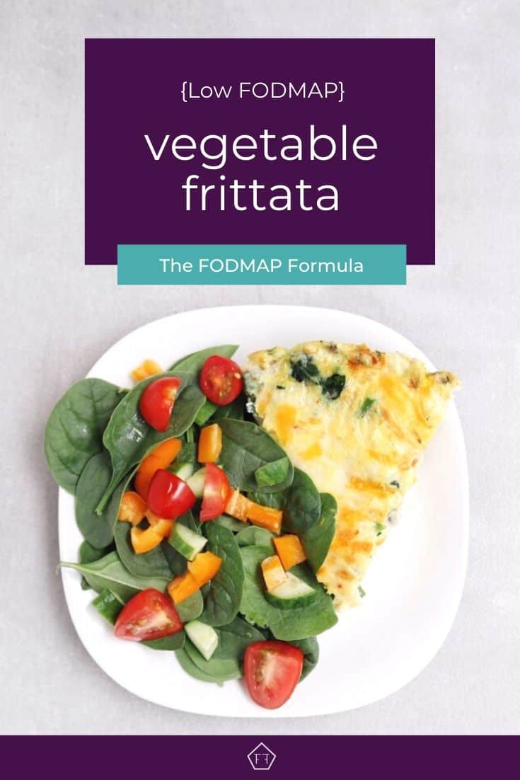 Low FODMAP vegetable frittata with vegetable salad on white plate
