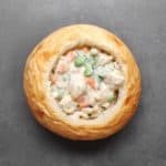 Low FODMAP chicken pot pie in bread bowl