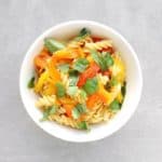 Low FODMAP pasta with roasted pepper sauce in bowl