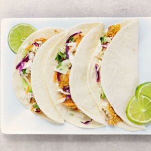 low FODMAP crunchy fish tacos on plate