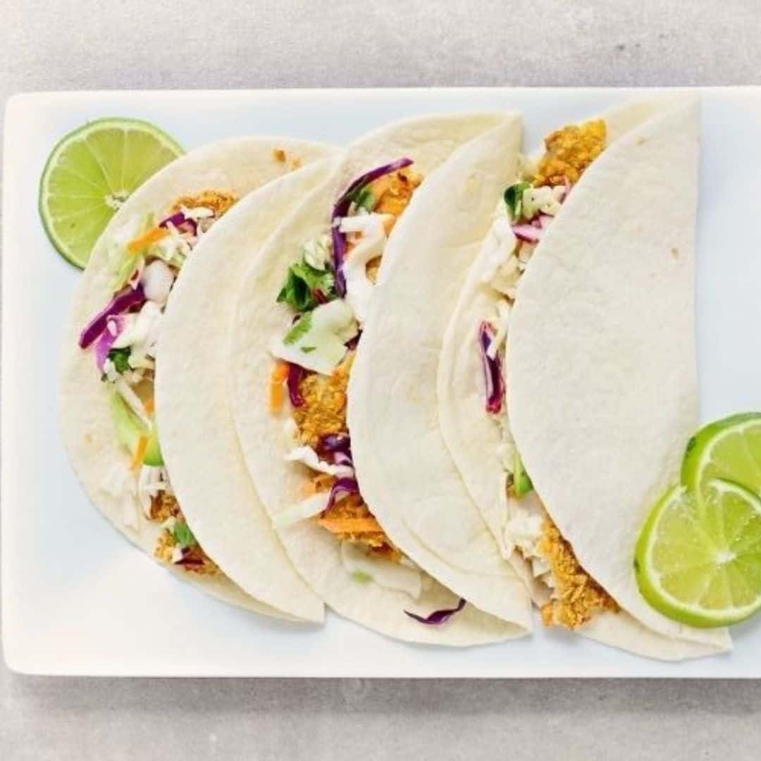 low FODMAP crunchy fish tacos on plate
