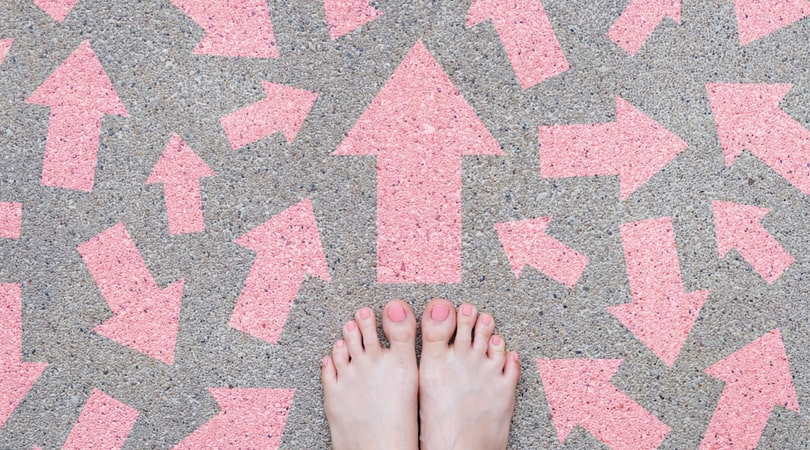 Bare Feet Surrounded by Arrows